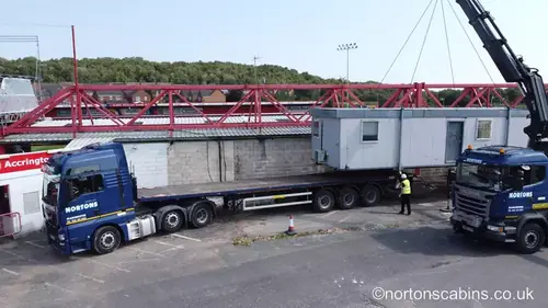 Artic unit pulling away after 855 lifts directors box