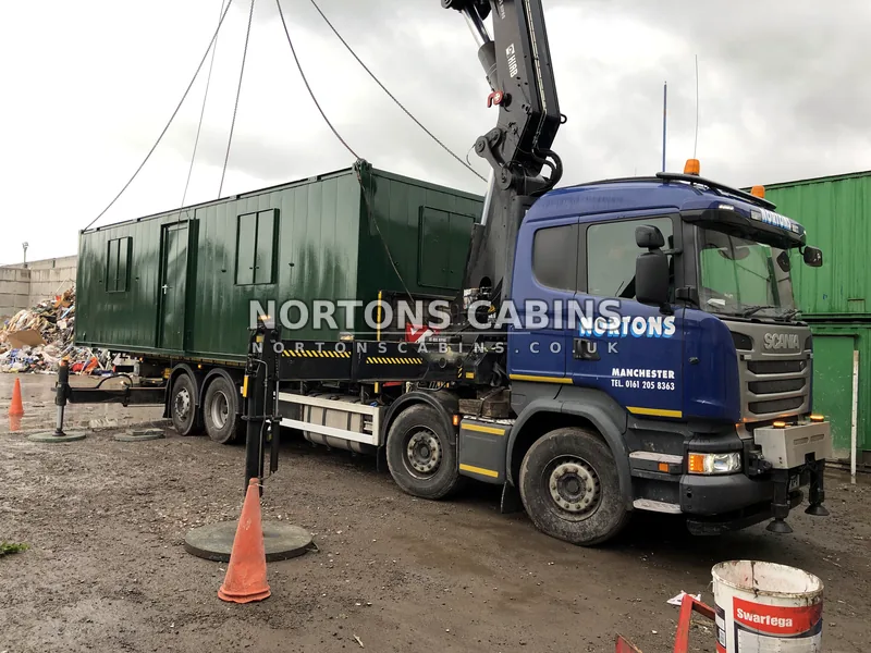 Linked cabins forming a modular building for sale