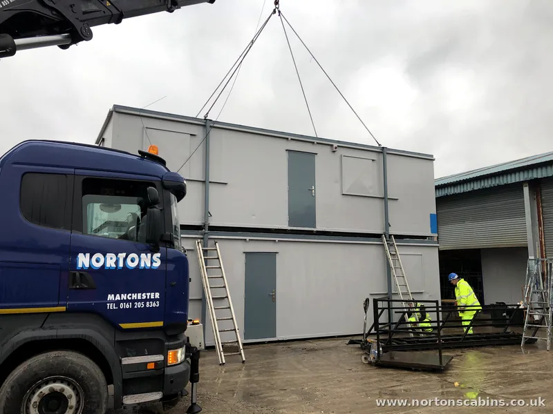 Craning a unit precisely into place on site