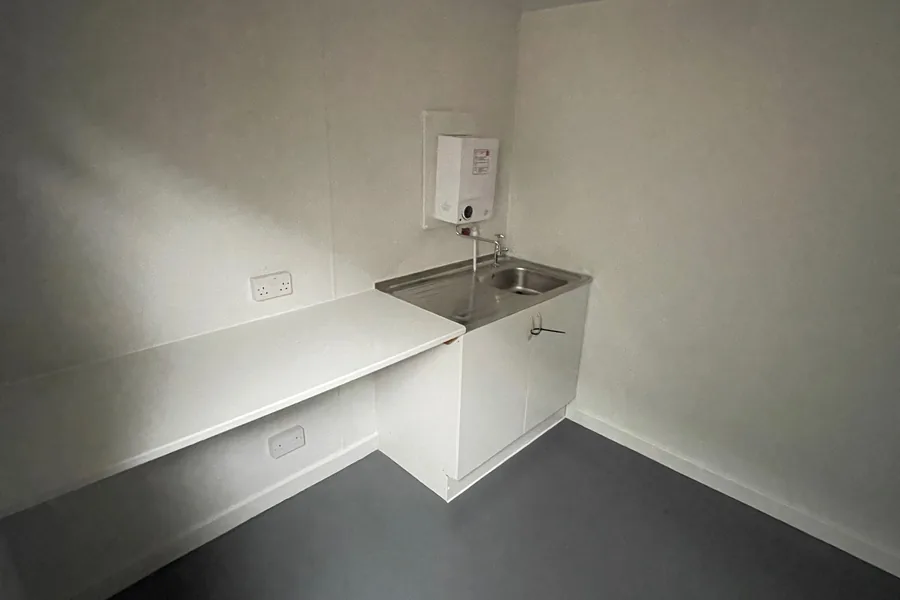 Kitchen cabin with stainless sink