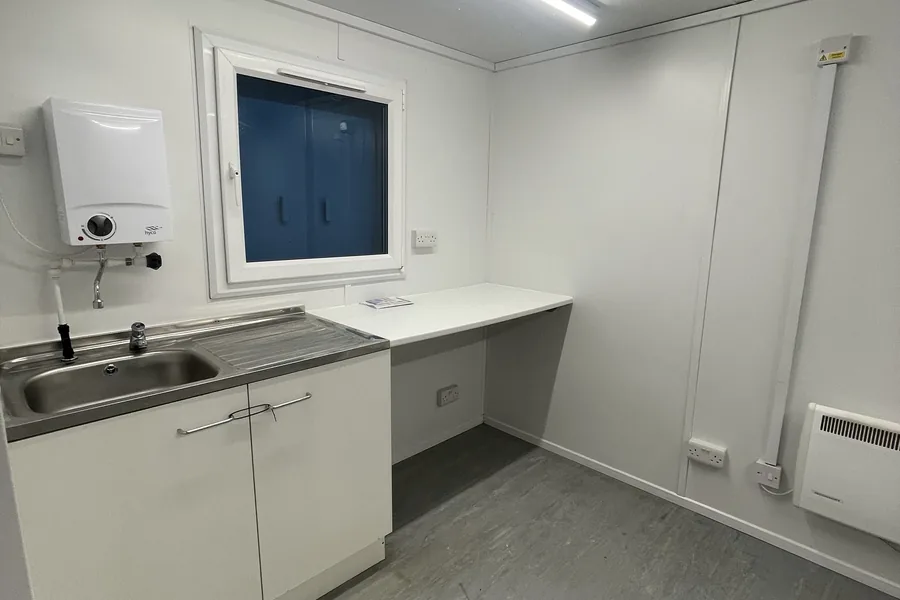 Site kitchen with water heater and sink