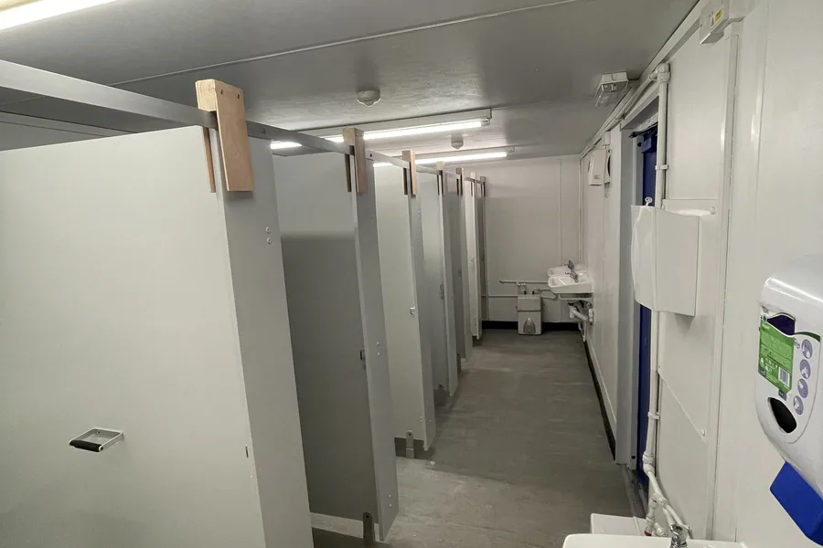 Toilet block cubicles and wash basins