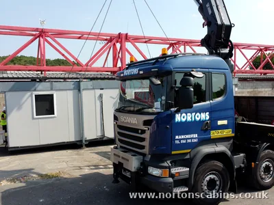 Our 855 HIAB lifting a cabin into position